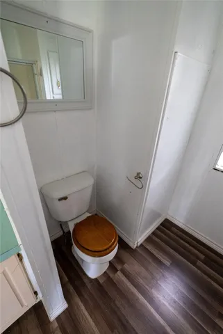 a bathroom with a toilet and a sink