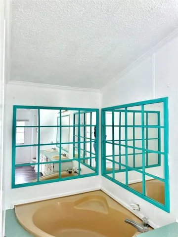 a view of a bath tub sitting in a balcony