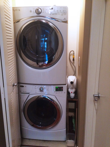 1111 West 15th Street, Unit 126 Chicago, IL 60608 - Photo 22 of 24 a utility room with dryer and washer