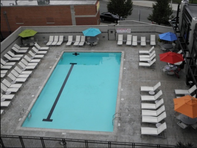 1111 West 15th Street, Unit 126 Chicago, IL 60608 - Photo 24 of 24 a backyard of a house with seating space