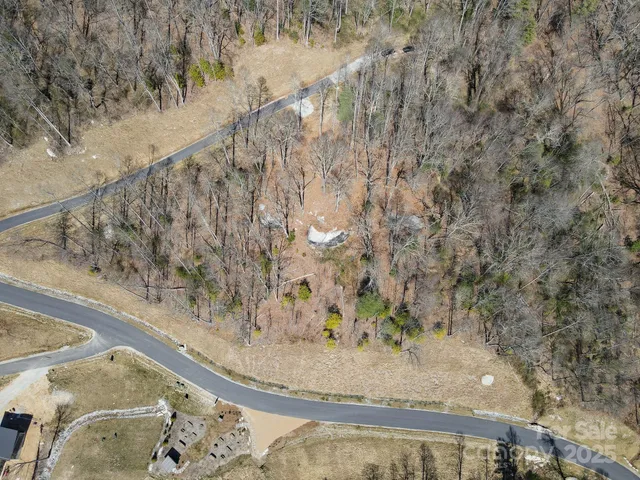 a view of a backyard of the house