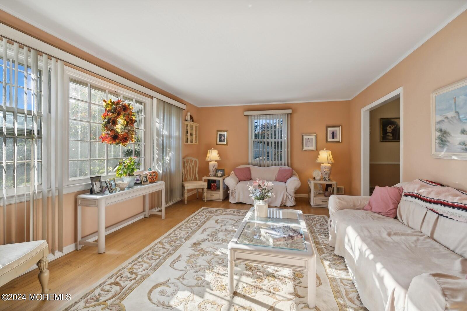 57 Pelican Road Middletown, NJ 07748 - Photo 13 of 49 a bedroom with furniture and a large window