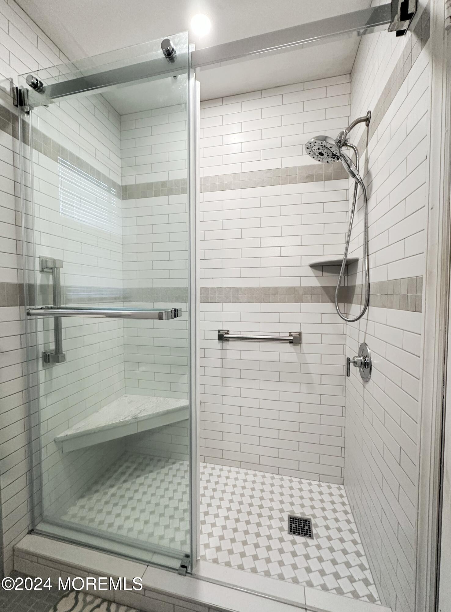 57 Pelican Road Middletown, NJ 07748 - Photo 34 of 49 a bathroom with a shower