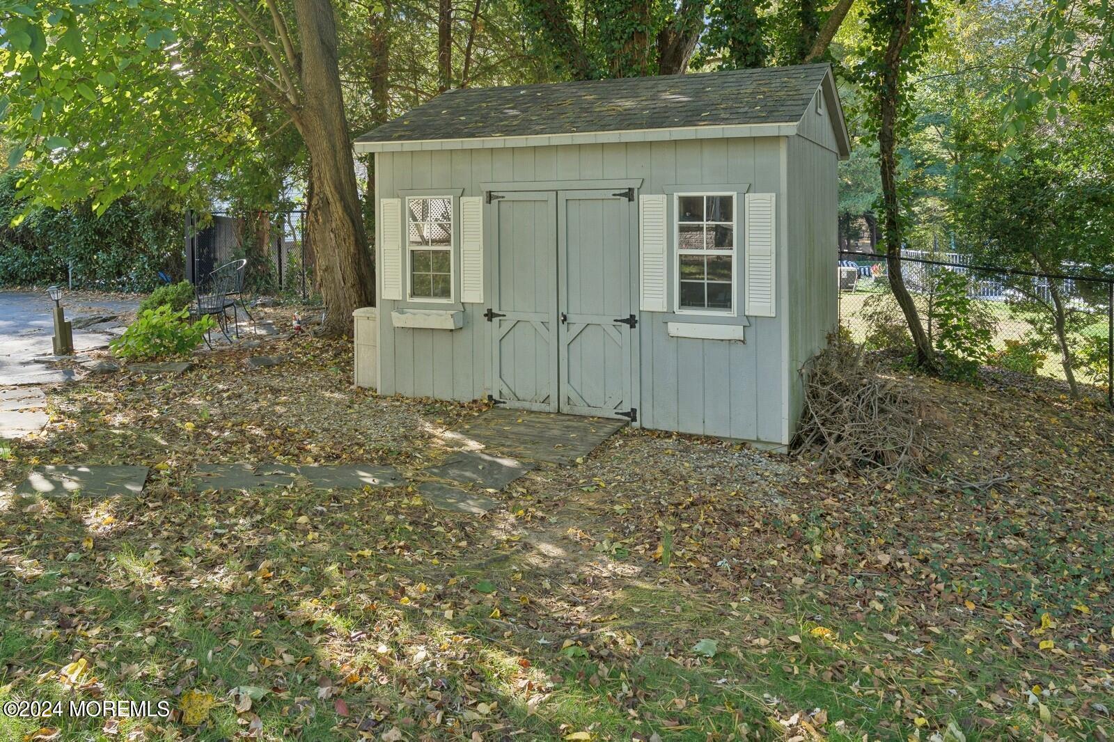 57 Pelican Road Middletown, NJ 07748 - Photo 39 of 49 a house view with a outdoor space