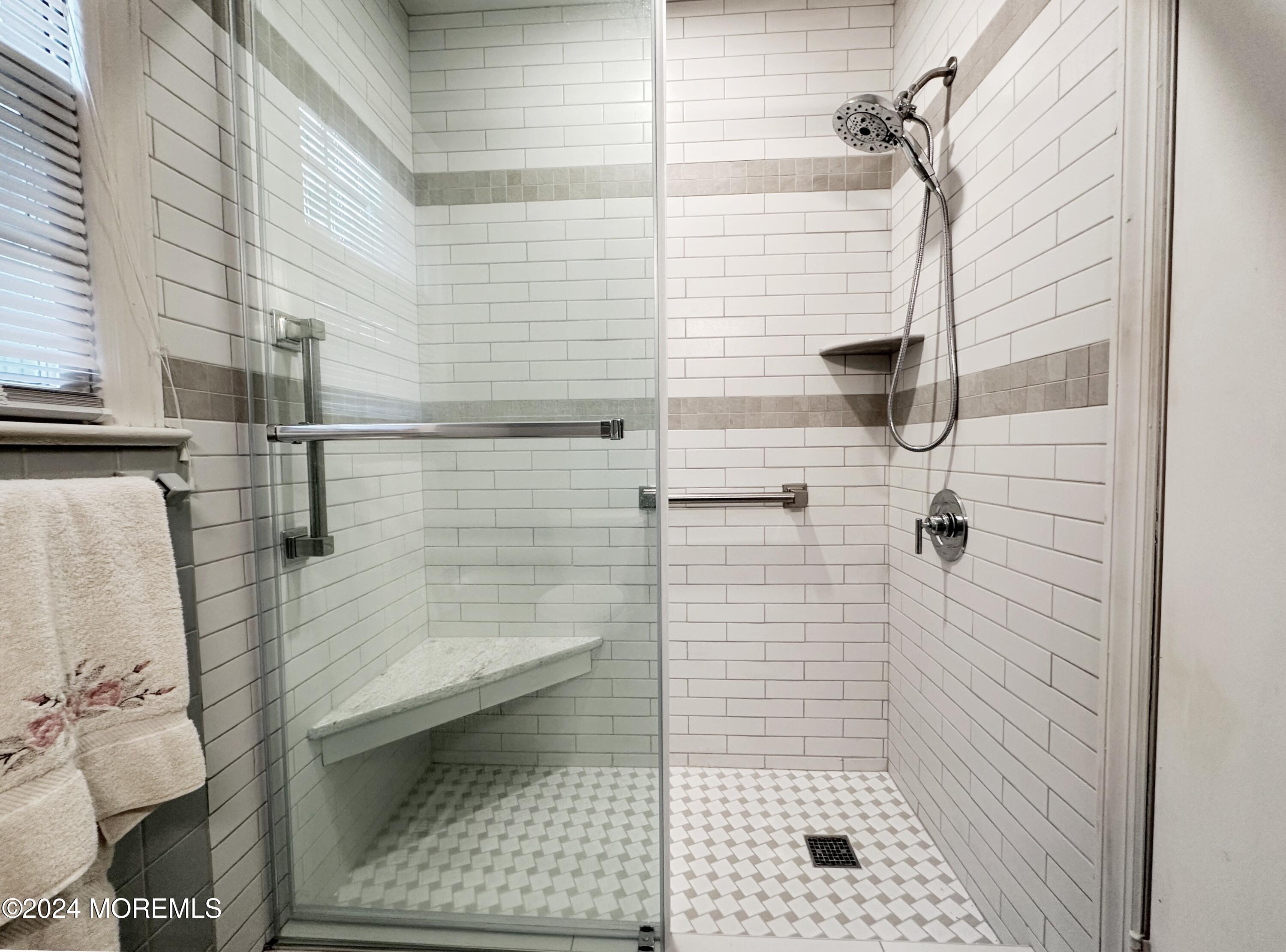 57 Pelican Road Middletown, NJ 07748 - Photo 4 of 49 a bathroom with a shower