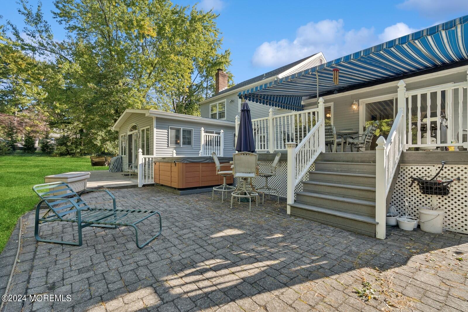 57 Pelican Road Middletown, NJ 07748 - Photo 7 of 49 a view of a house with backyard and sitting area