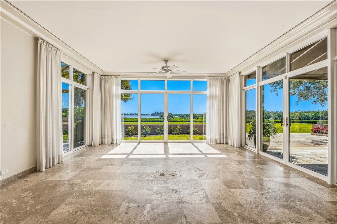 2350 Quay Dock Road Vero Beach, FL 32967 - Photo 18 of 35 a view of an empty room with windows