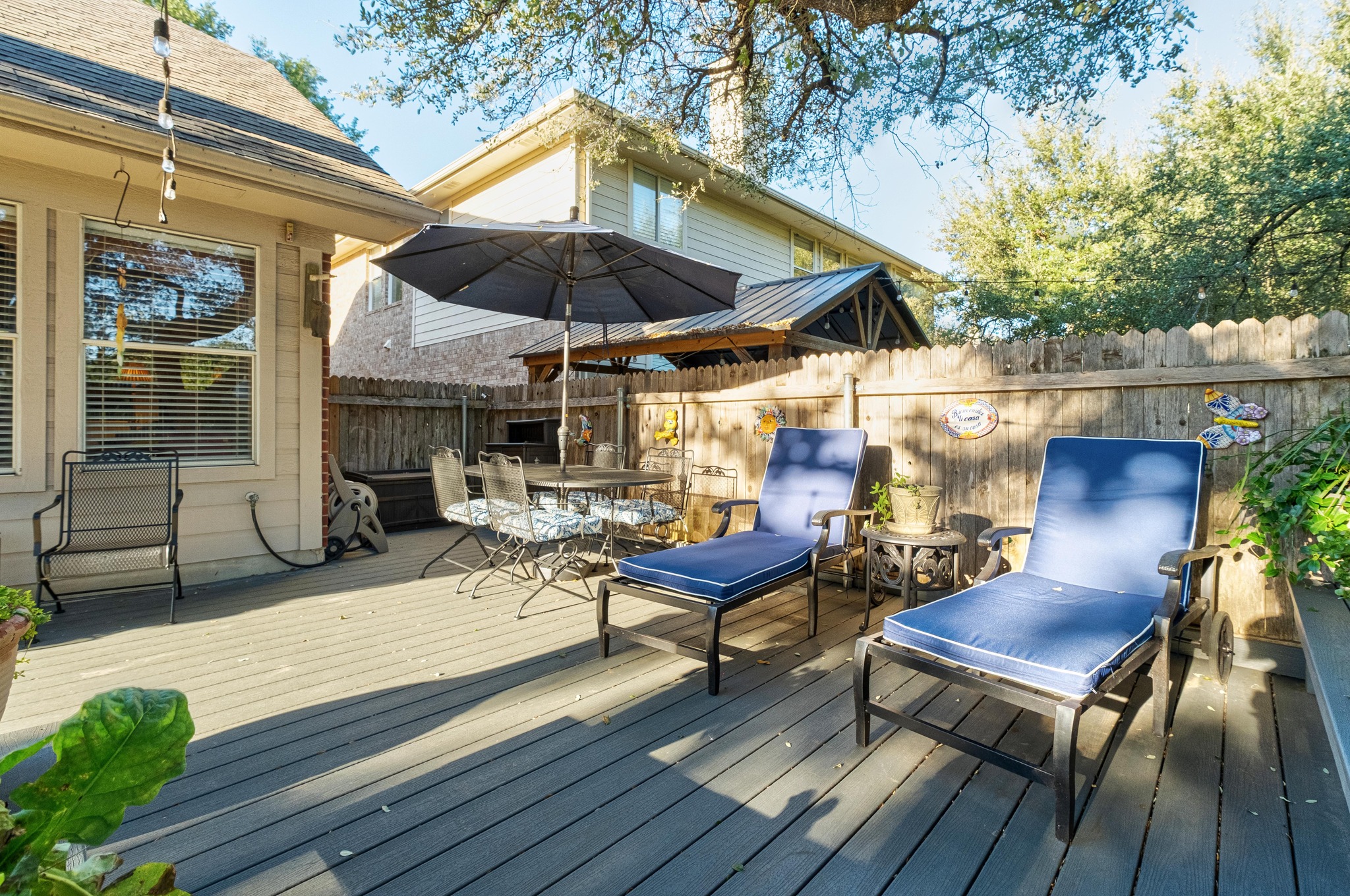 1506 Old Mill Road Cedar Park, TX 78613 - Photo 26 of 40 The spacious deck and beautiful backyard provide the perfect setting for outdoor entertaining and gatherings.