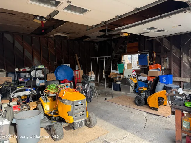 a view of a balcony with furniture