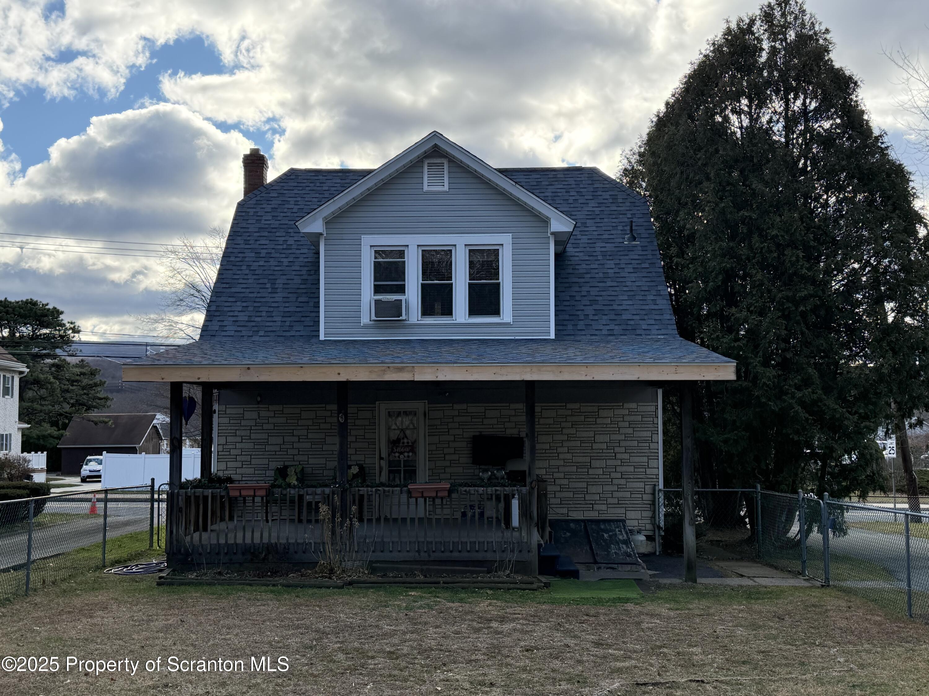 116 South Main Street Archbald, PA 18403 - Photo 9 of 31 a front view of a house with garden