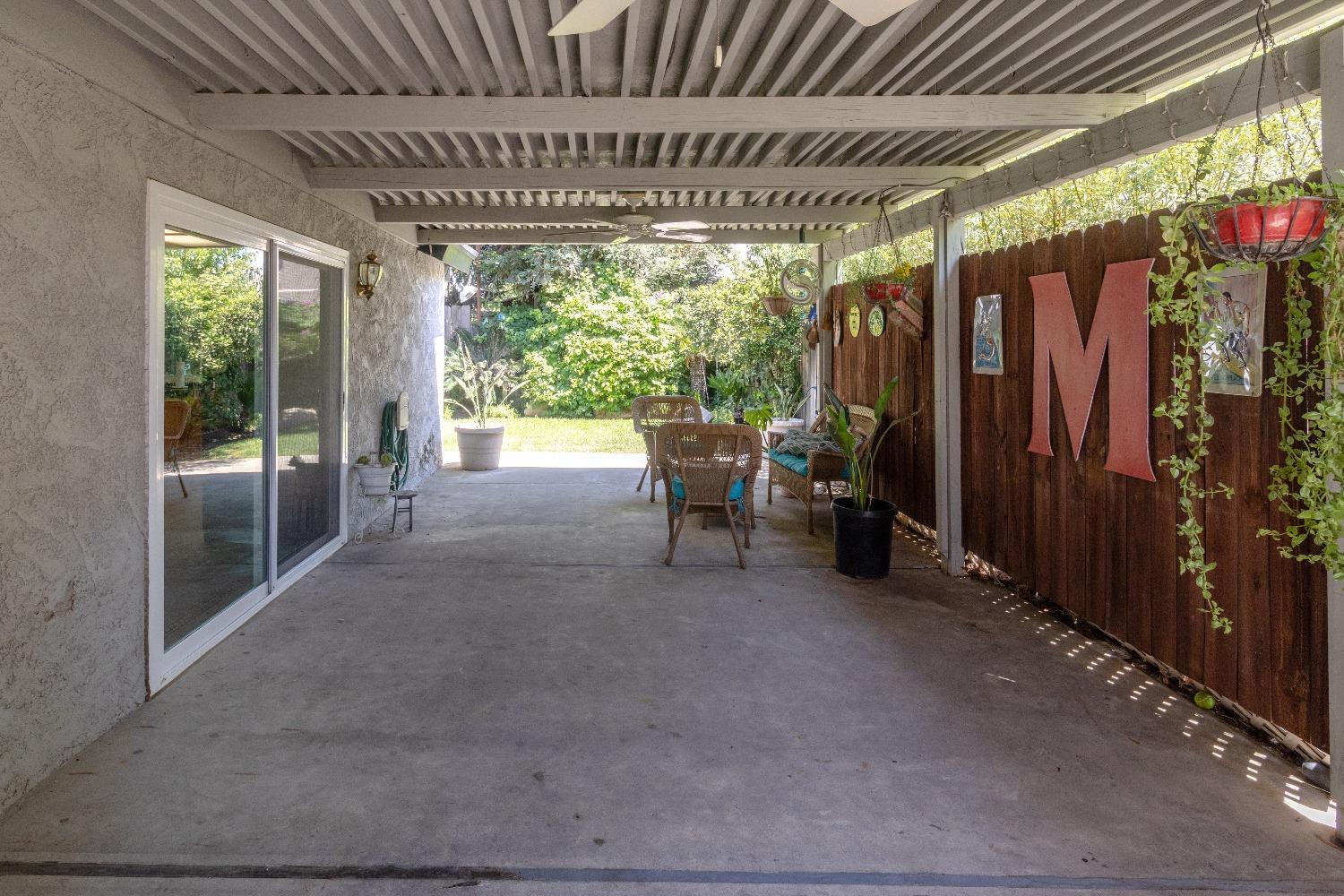 1955 Alamos Avenue Clovis, CA 93611 - Photo 21 of 28 a view of a porch with furniture and floor