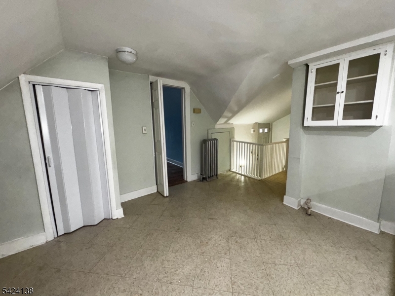 160 Chestnut Street, Unit 2 Montclair, NJ 07042 - Photo 13 of 20 an empty room with closet and windows