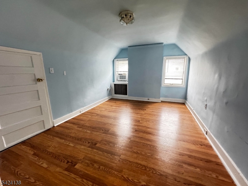 160 Chestnut Street, Unit 2 Montclair, NJ 07042 - Photo 20 of 20 wooden floor in an empty room with a window