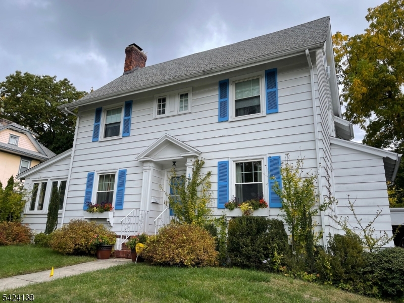 160 Chestnut Street, Unit 2 Montclair, NJ 07042 - Photo 2 of 20 a front view of a house with a garden