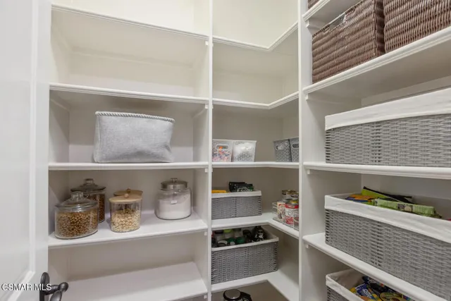 a spacious bathroom with a granite countertop tub sink and mirror