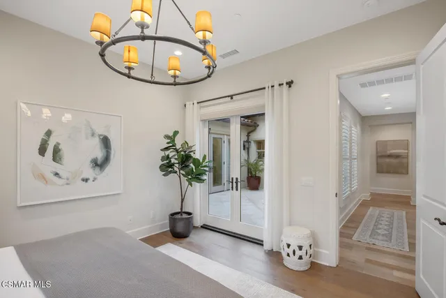 a view of a potted plants in front of house