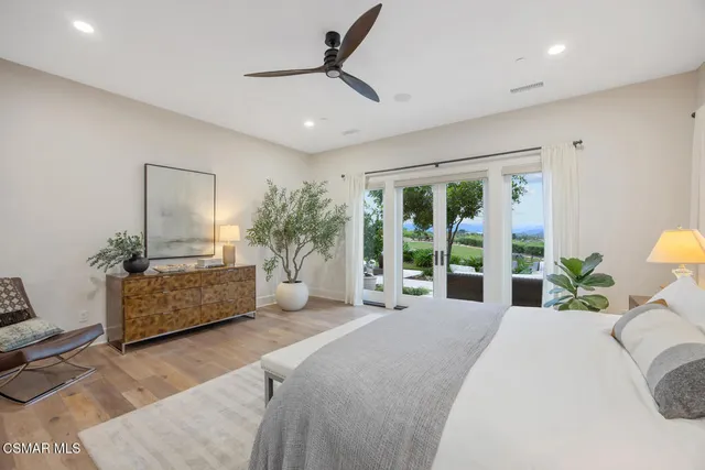 an aerial view of a house with a garden