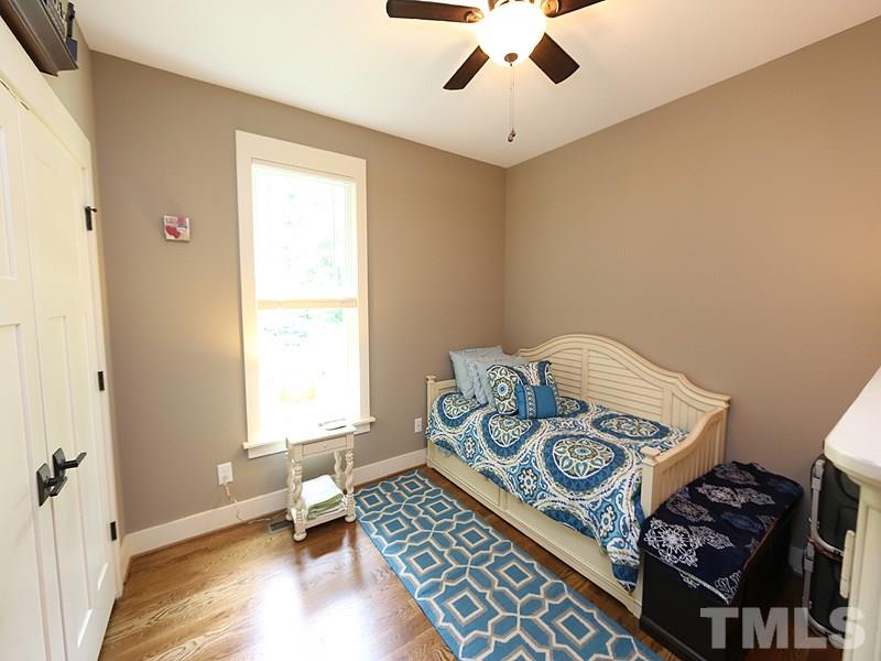 7401 Denlee Road Raleigh, NC 27603 - Photo 12 of 25 a living room with furniture and a window