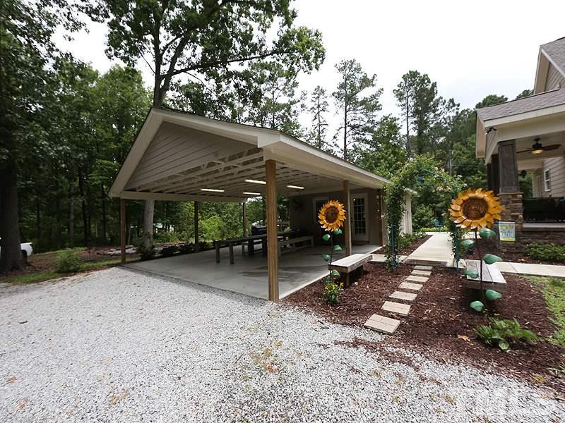 7401 Denlee Road Raleigh, NC 27603 - Photo 17 of 25 a view of a house with a patio