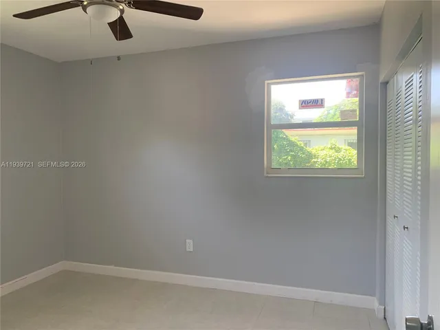 en empty room with windows