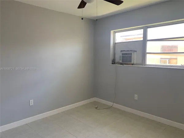 an empty room with a window