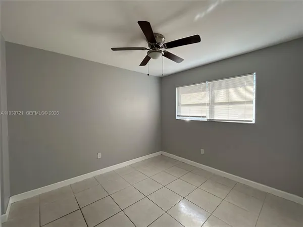 a view of a window in an empty room