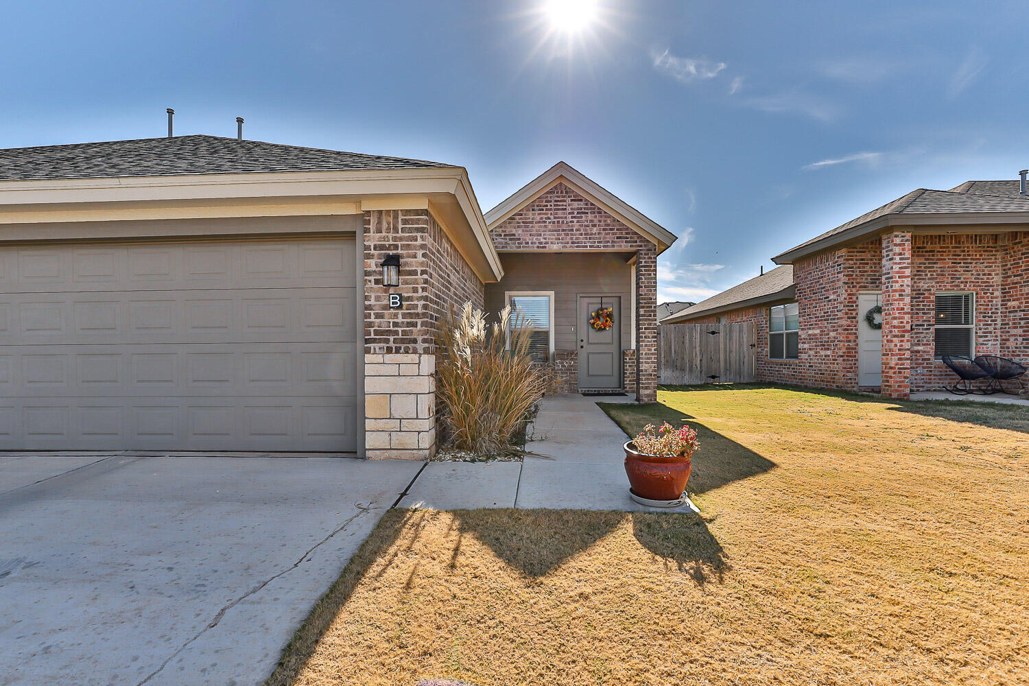 5527 121st Street, Unit A Lubbock, TX 79424 - Photo 2 of 41 a view of a house with swimming pool