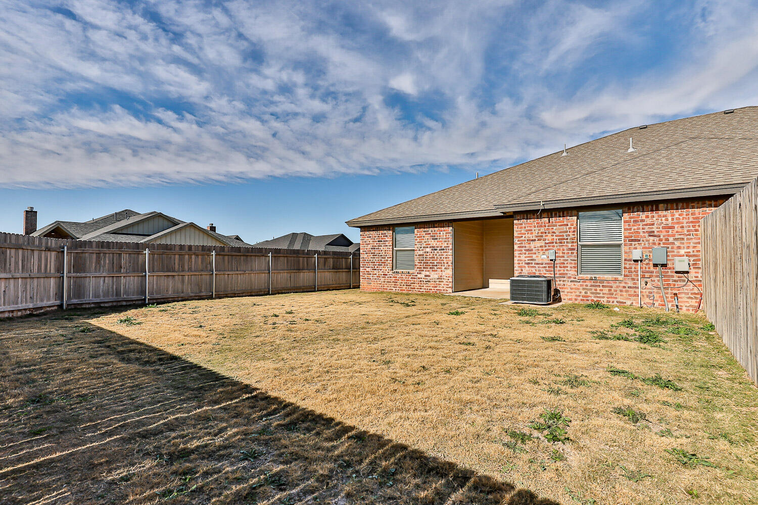 5527 121st Street, Unit A Lubbock, TX 79424 - Photo 41 of 41 a big room with wooden fence