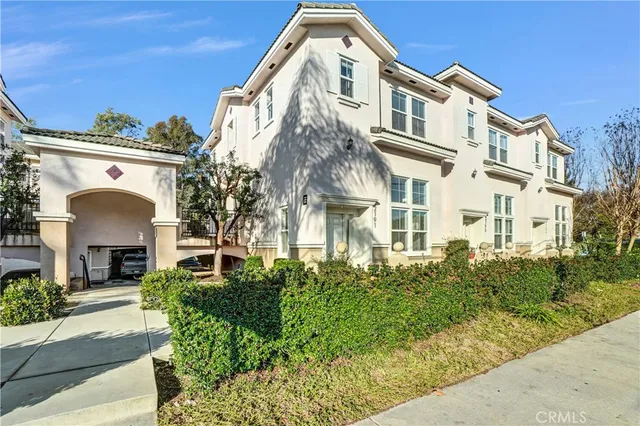 a front view of a multi story residential apartment building