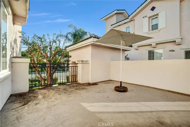 a view of entryway with wooden floor and stairs