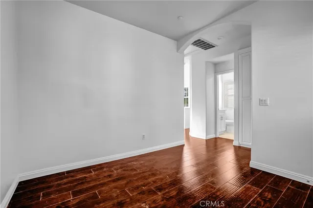 wooden floor in a hall with an entryway
