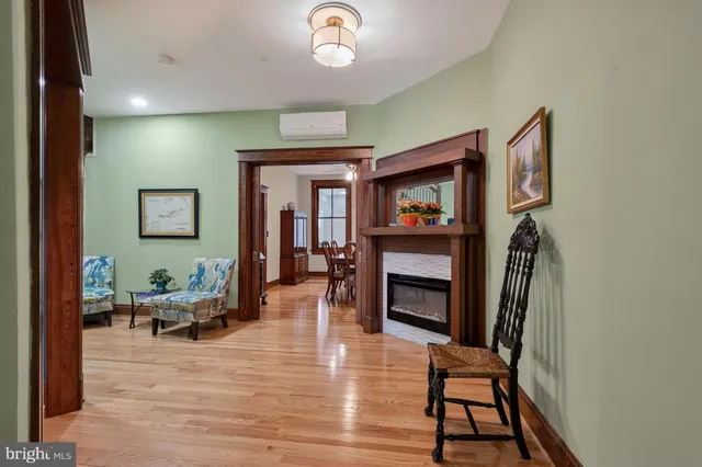 a kitchen with granite countertop a stove and a microwave