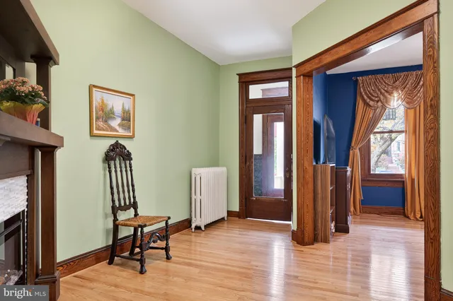 a kitchen with granite countertop a stove top oven microwave and cabinets