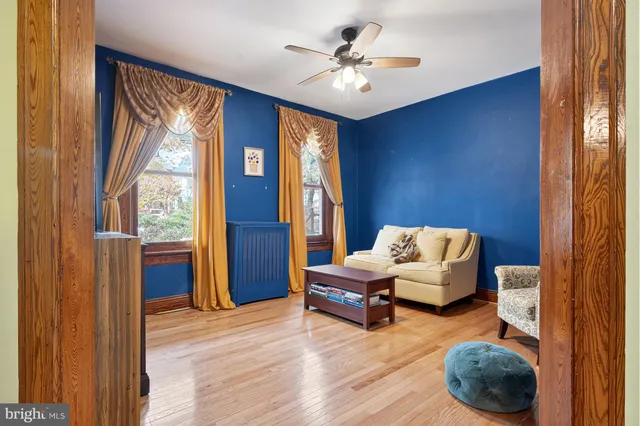 a kitchen with stainless steel appliances granite countertop a stove top oven a sink dishwasher and cabinets with wooden floor