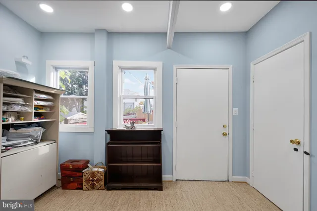 a workspace with furniture and book shelf