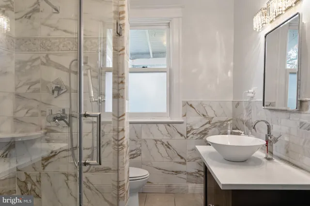 a bedroom with a bed and a cabinets