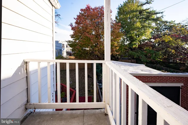 a view of a chairs and table on the deck