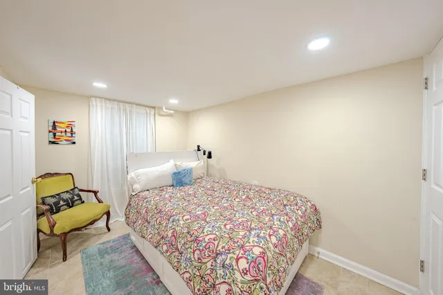 a view of a house with a backyard and sitting area