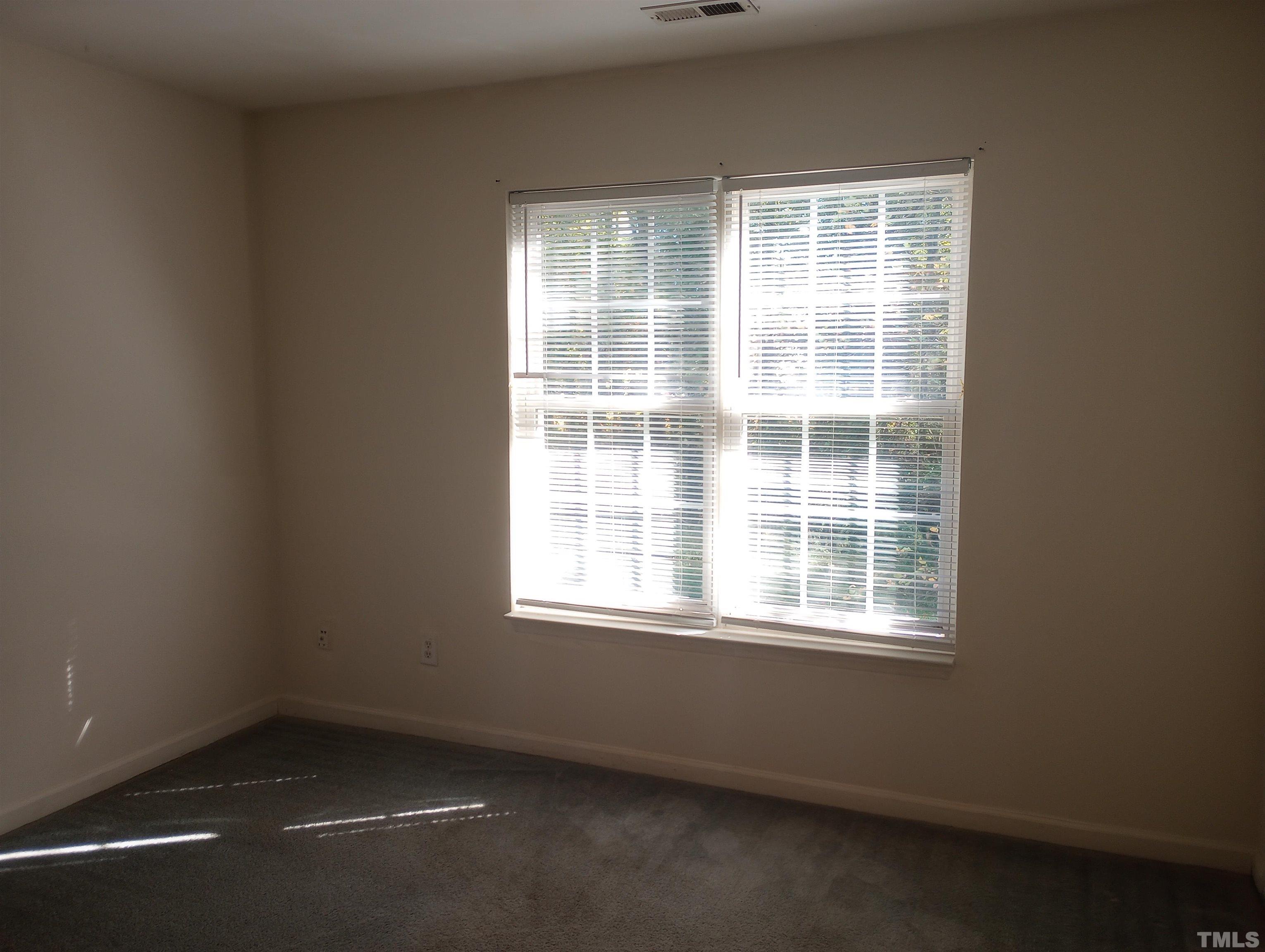 65 Red Lane Raleigh, NC 27606 - Photo 12 of 24 an empty room with a window