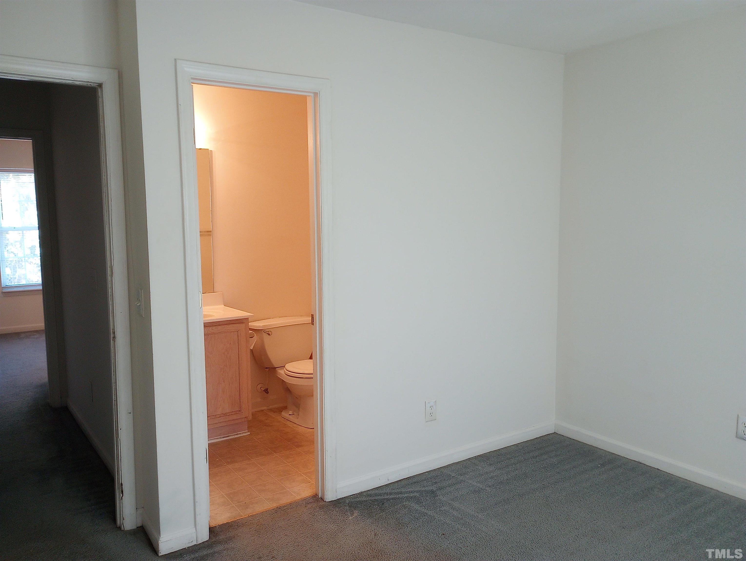 65 Red Lane Raleigh, NC 27606 - Photo 14 of 24 an empty room and a hallway