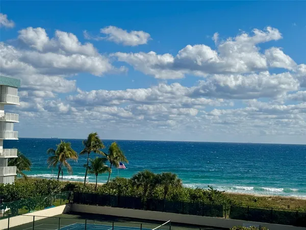 a view of an ocean from a balcony