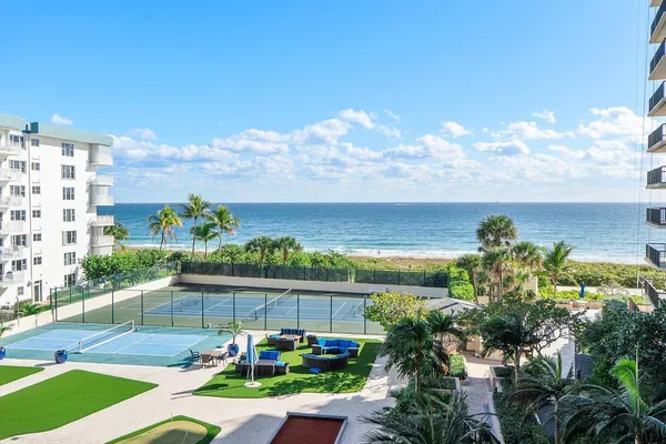 a bathroom with a granite countertop sink mirror and double