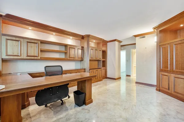 a kitchen with a stove a sink and a refrigerator