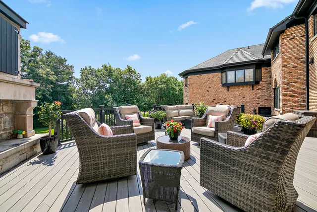 a view of a house with a yard and garage