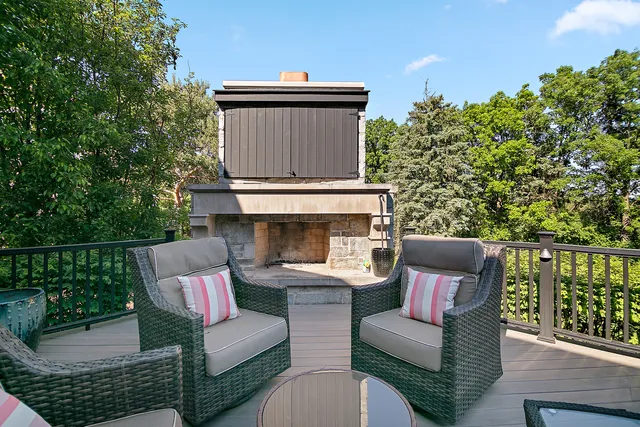 a bedroom with a bed and large mirror