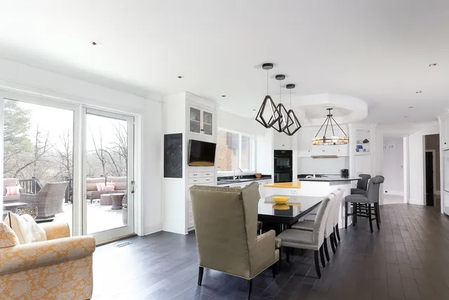 an aerial view of a house with swimming pool and big yard