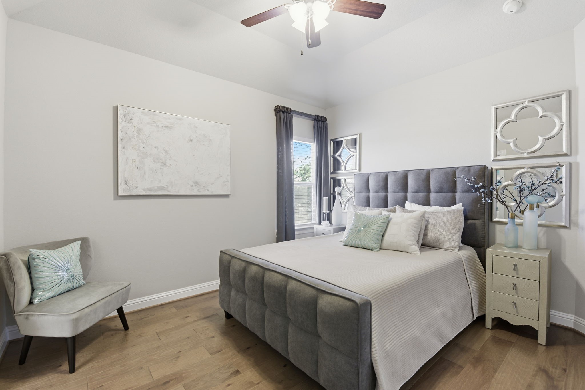 5811 Stratton Woods Dr Spring Spring, TX 77389 - Photo 31 of 38 a bedroom with a large bed and a couch