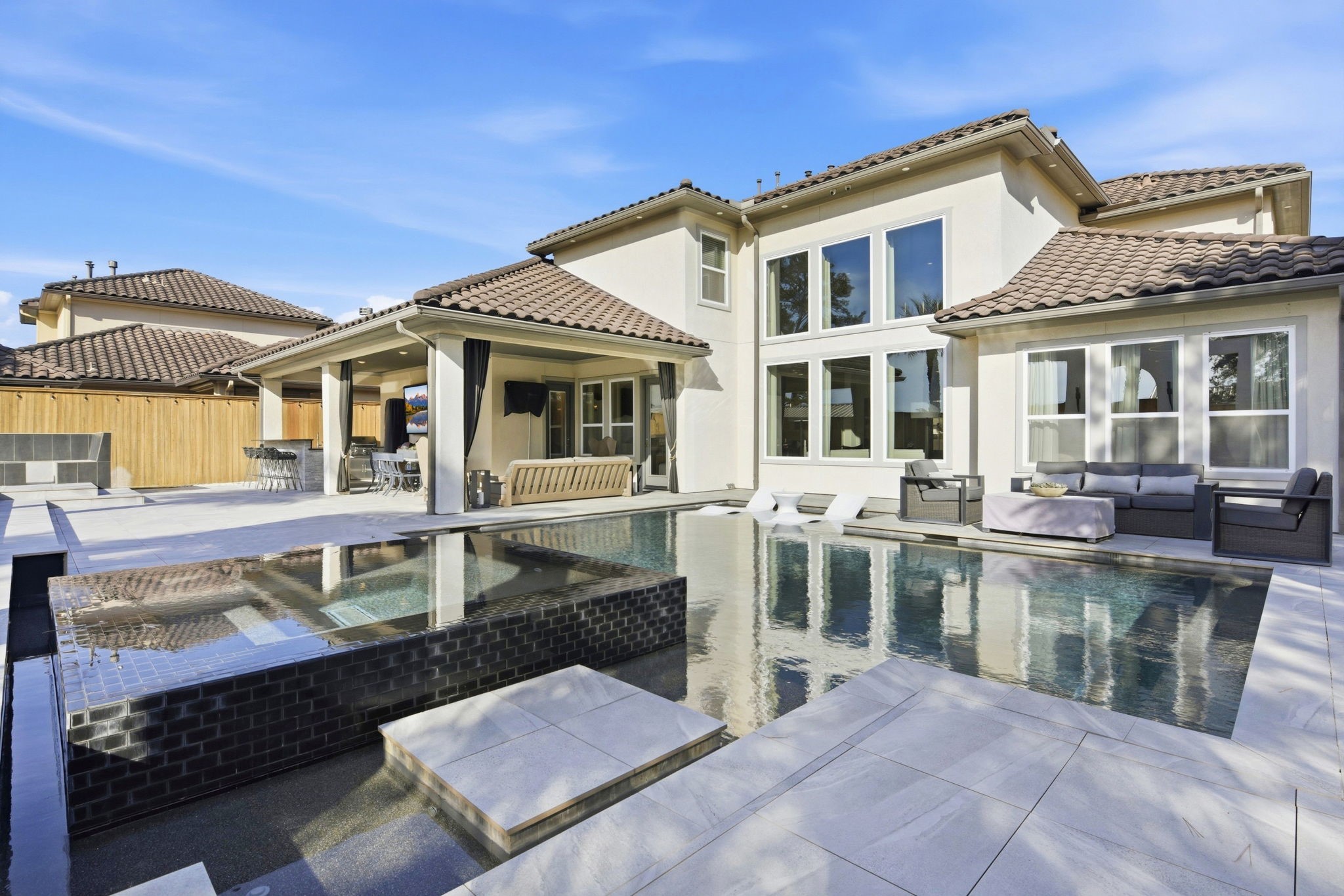 5811 Stratton Woods Dr Spring Spring, TX 77389 - Photo 38 of 38 a front view of a house with a yard glass top table and chairs