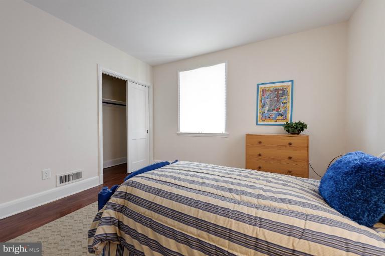 713 Charing Cross Road Baltimore, MD 21229 - Photo 15 of 29 a bedroom with a bed and a window