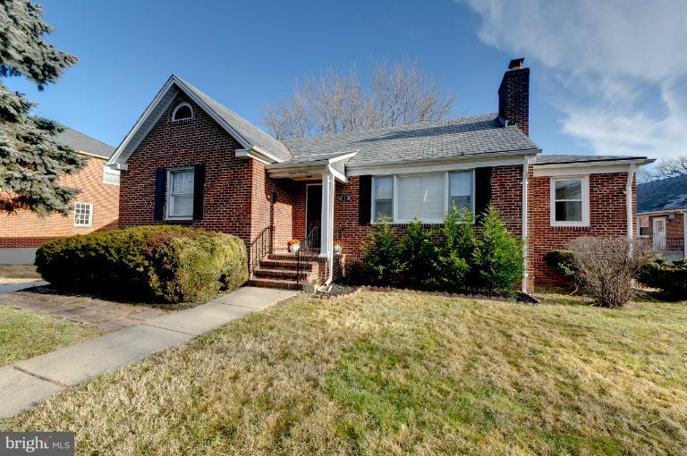 713 Charing Cross Road Baltimore, MD 21229 - Photo 21 of 29 a view of a house with a yard and plants